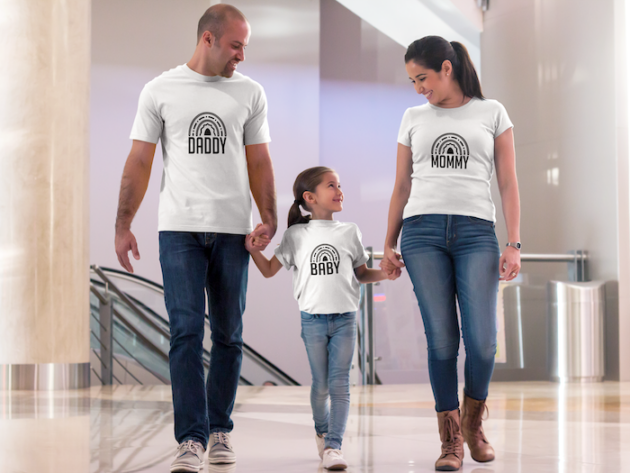 father mother and daughter walking at the mall wearing different tshirts mockup a15672
