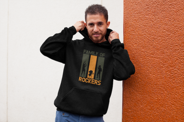 heathered hoodie pullover mockup of a man leaning on a bicolor wall 28627 1