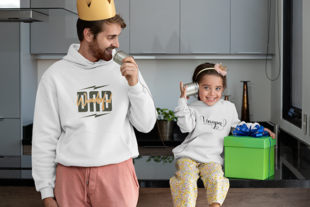 hoodie mockup featuring a man playing with his daughter on father s day 33091