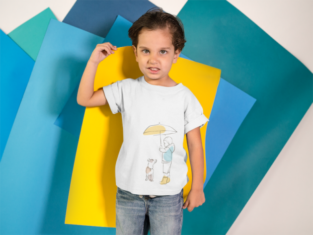 kid making an angry face while holding a yellow paper on his back wears a t shirt mockup a16144