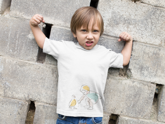 little boy wearing a t shirt mockup while raising his arms a17943