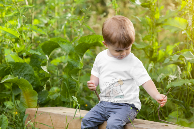 mockup of a boy wearing a t shirt in nature 2917 el1
