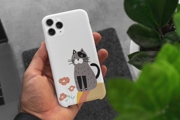 mockup of a man holding a phone case in his hand 5165 el1 11