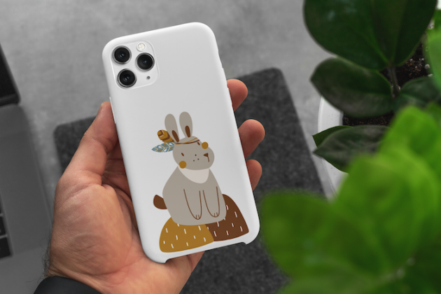 mockup of a man holding a phone case in his hand 5165 el1 2