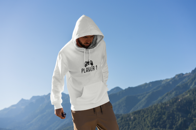 mockup of a man wearing a hoodie with mountains in the background 2770 el1 1