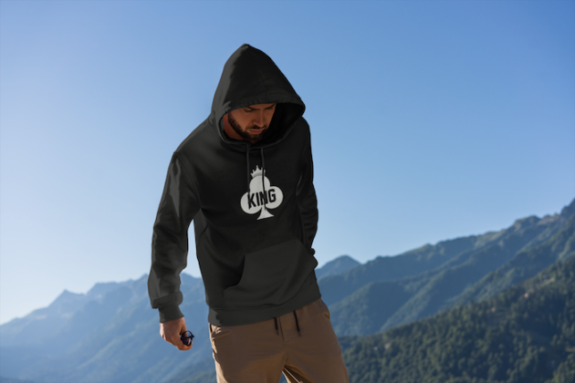 mockup of a man wearing a hoodie with mountains in the background 2770 el1 2