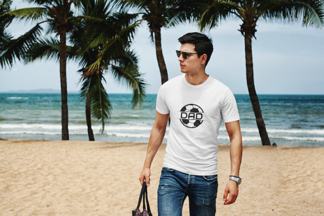 mockup of a man with sunglasses wearing a t shirt at the beach 432 el