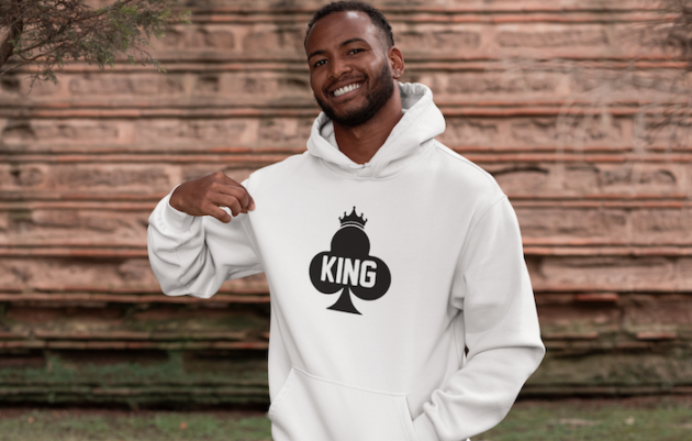 mockup of a smiling man showing off his pullover hoodie 30305