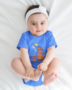 onesie mockup featuring a baby girl lying on a white bed m6223 r el2 3