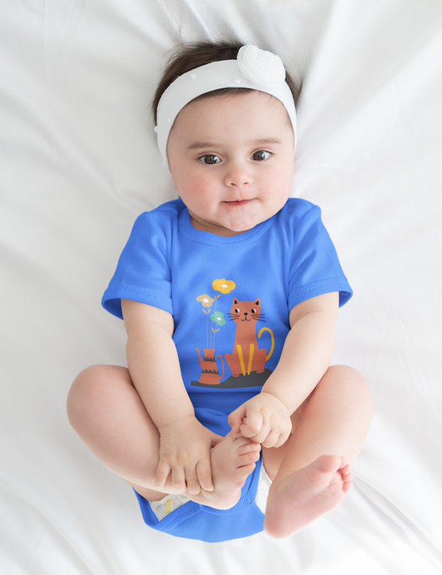 onesie mockup featuring a baby girl lying on a white bed m6223 r el2 3