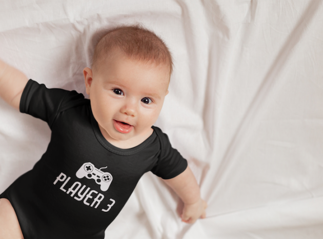 onesie mockup featuring a playful baby m19344 r el2
