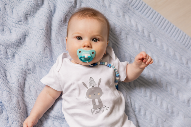onesie mockup featuring an adorable baby with a pacifier in his mouth m19211 r el2 4