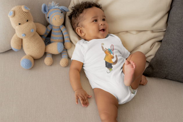 onesie mockup of a cute baby boy lying in bed with stuffed animals 25121 3