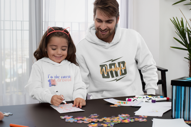 pullover hoodie mockup of a daughter and her father drawing 33086 2