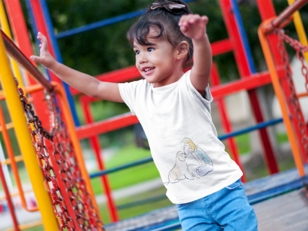 smiling little girl at a playground t shirt mockup a7681 1