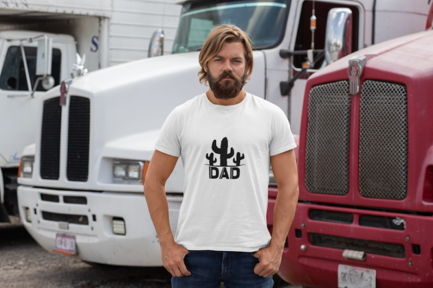 t shirt mockup featuring a bearded man in front of trailer trucks 29480