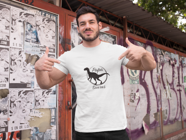 t shirt mockup of a fitness man posing against a wall with posters 28526