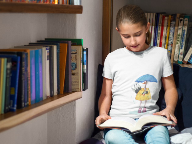 t shirt mockup of a girl reading a book at a library a7931