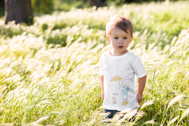 t shirt mockup of a little boy surrounded by tall grass 2912 el1 2