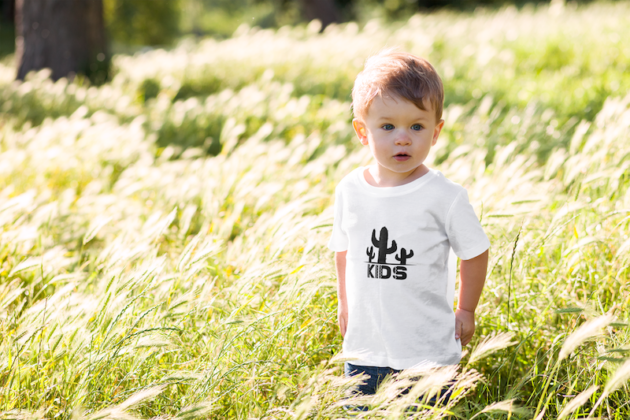 t shirt mockup of a little boy surrounded by tall grass 2912 el1 3
