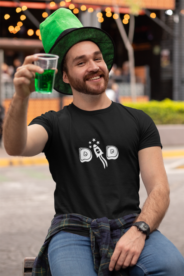 t shirt mockup of a man at a st patricks celebration drinking a green beer 32118