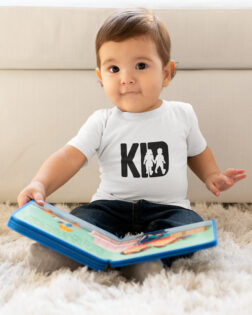 t shirt mockup of a toddler playing with a book m1001