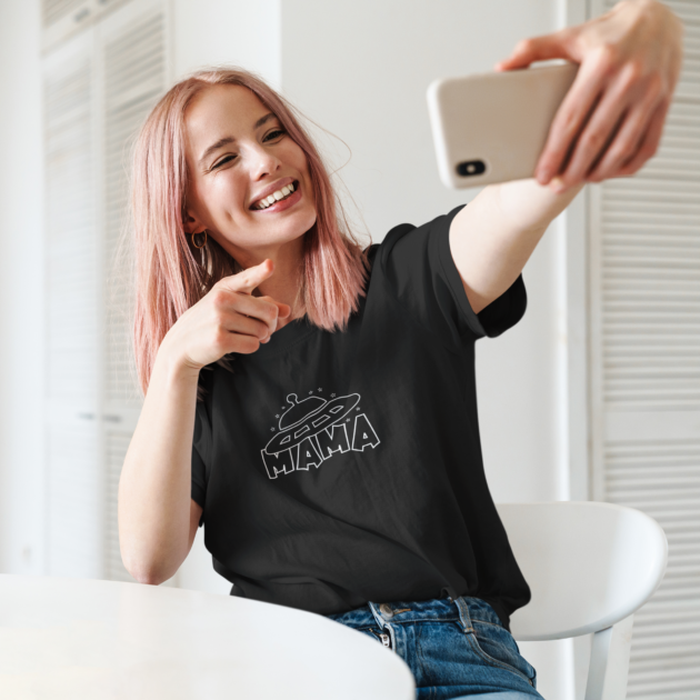 unisex t shirt mockup featuring a woman with pink hair taking a selfie 44785 r el2 1