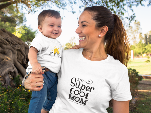 baby boy smiling with his mom wearing different round neck t shirts mockup outdoors a16103