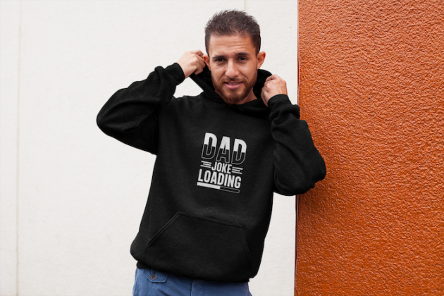 heathered hoodie pullover mockup of a man leaning on a bicolor wall 28627 3