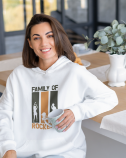 hoodie mockup featuring a happy woman sitting in her dining room m19089 r el2