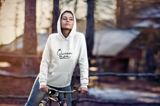 hoodie mockup of a woman riding a bike in the forest 2779 el1 2