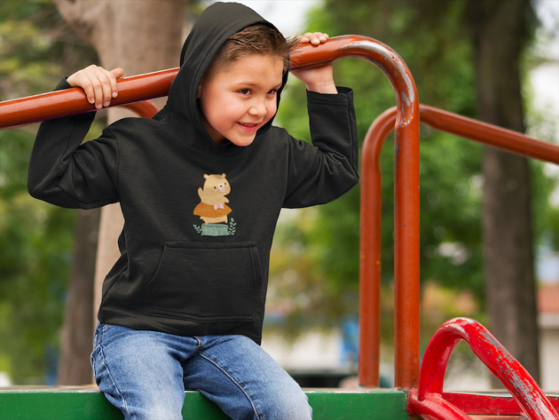 little boy wearing a hoodie at a park mockup 9110 2