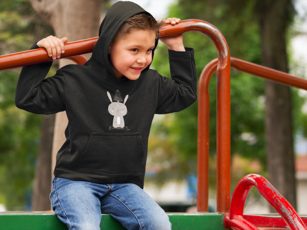 little boy wearing a hoodie at a park mockup 9110 3