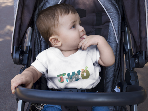 mockup of a baby boy wearing a round neck tshirt template while on his stroller a16089 2