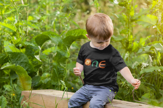 mockup of a boy wearing a t shirt in nature 2917 el1