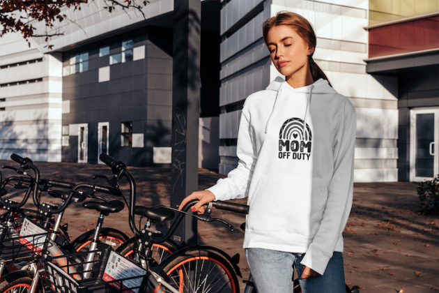 mockup of a woman with a hoodie posing by a bike station 2824 el1 4