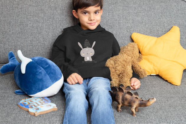 pullover hoodie mockup featuring a kid with his cuddly toys 32170 2