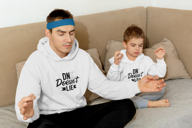 pullover hoodie mockup of a dad and his son meditating on a couch m23102 r el2