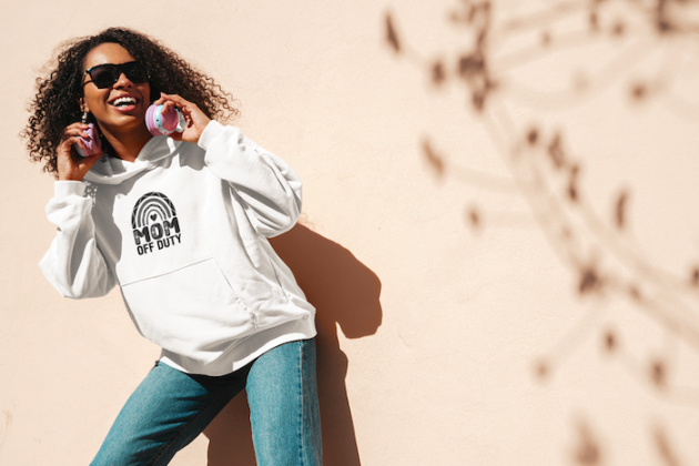 pullover hoodie mockup of a happy woman with headphones around her neck m25805 r el2