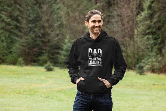 pullover hoodie mockup of a smiling man in an open green area 25103 1