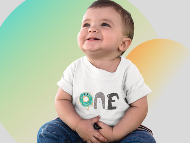 transparent t shirt mockup of a baby boy looking up while smiling a16078